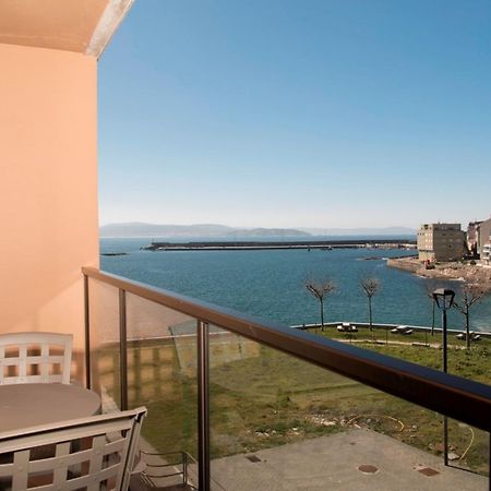 Apartamentos Turisticos Playa De Osmo Corme ภายนอก รูปภาพ