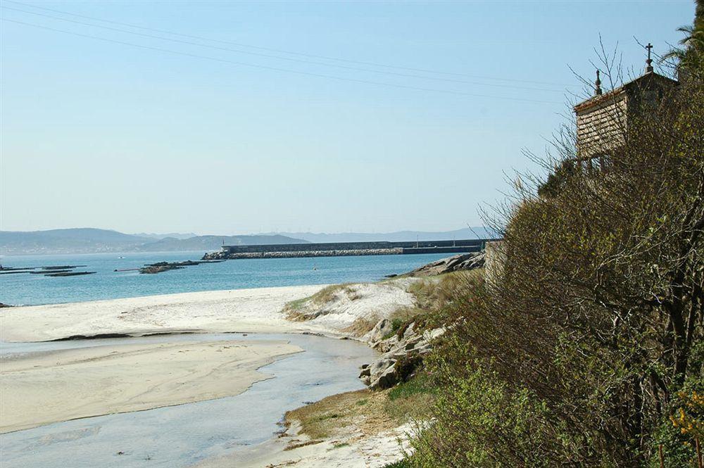 Apartamentos Turisticos Playa De Osmo Corme ภายนอก รูปภาพ