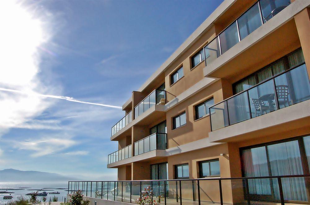 Apartamentos Turisticos Playa De Osmo Corme ภายนอก รูปภาพ