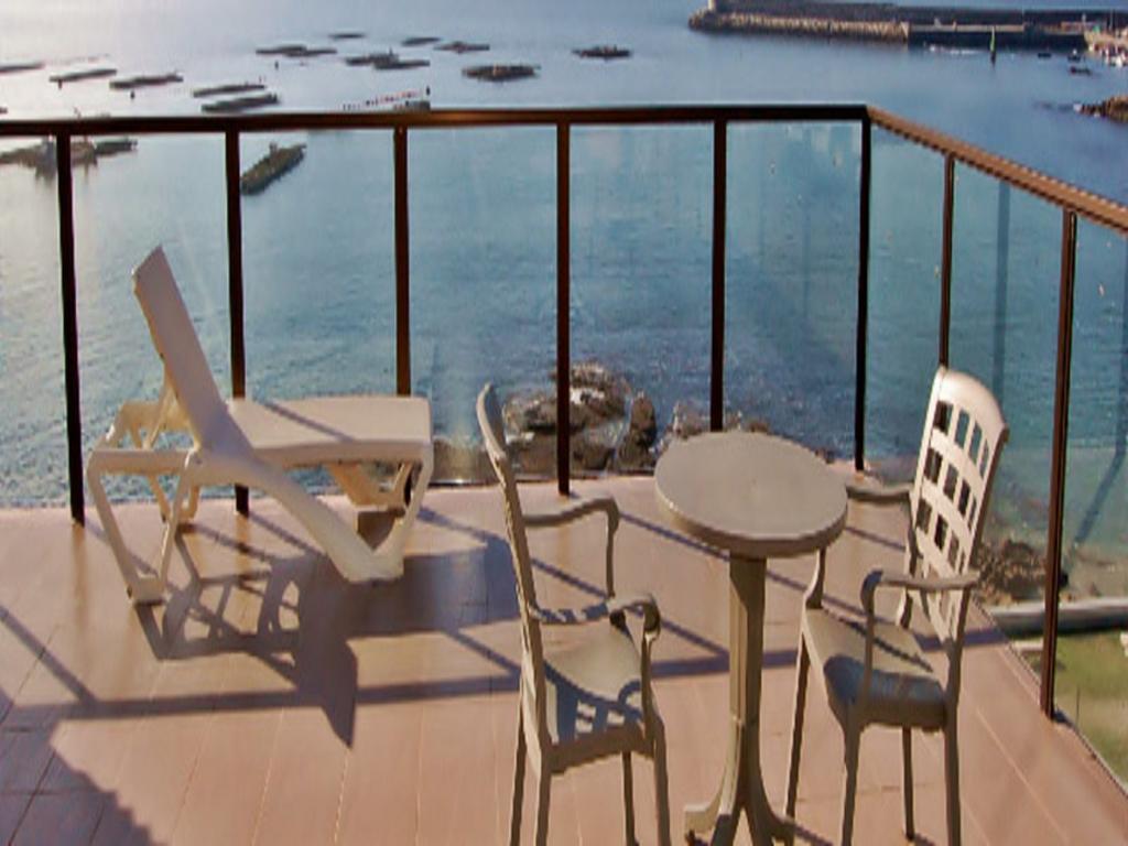 Apartamentos Turisticos Playa De Osmo Corme ภายนอก รูปภาพ