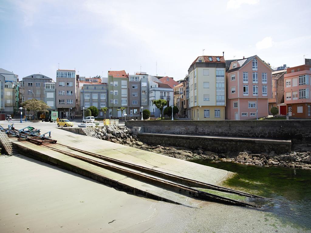 Apartamentos Turisticos Playa De Osmo Corme ภายนอก รูปภาพ