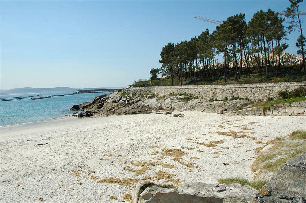 Apartamentos Turisticos Playa De Osmo Corme ภายนอก รูปภาพ