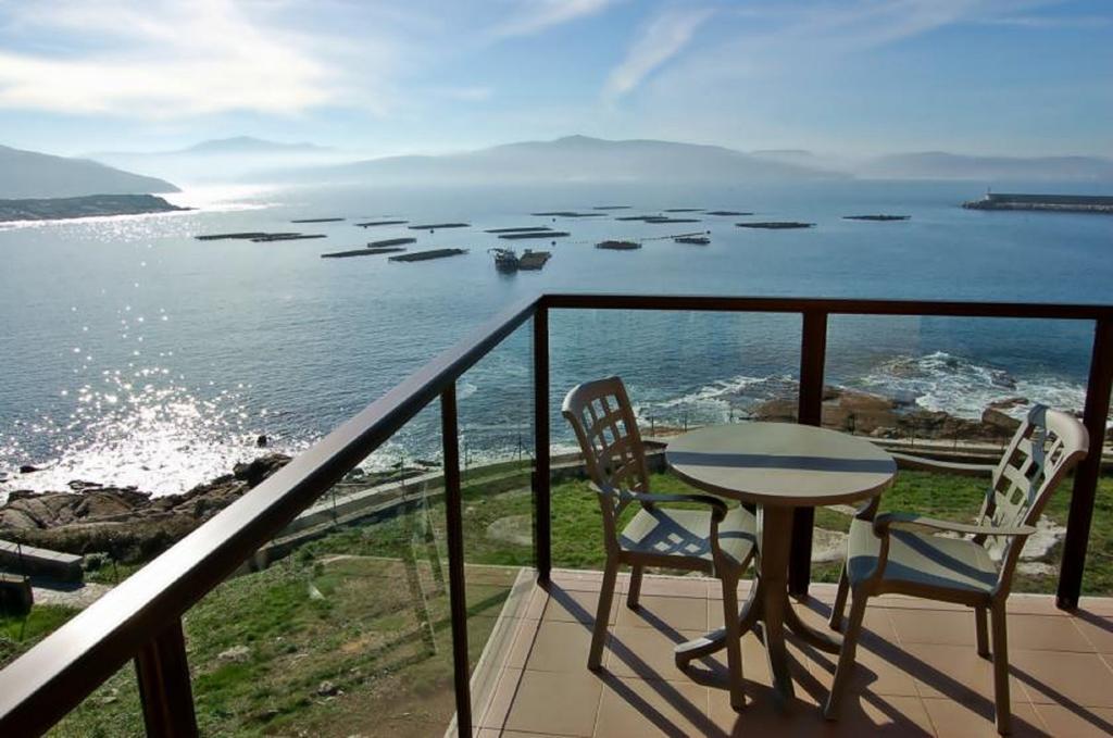 Apartamentos Turisticos Playa De Osmo Corme ภายนอก รูปภาพ