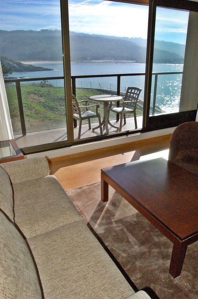Apartamentos Turisticos Playa De Osmo Corme ภายนอก รูปภาพ