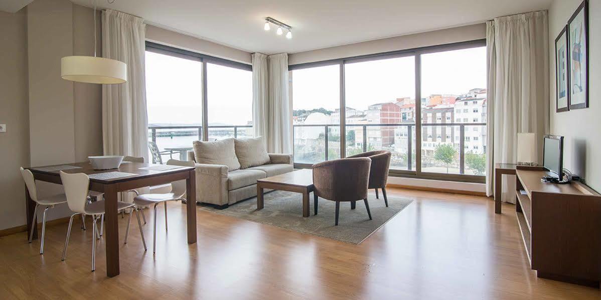 Apartamentos Turisticos Playa De Osmo Corme ภายนอก รูปภาพ