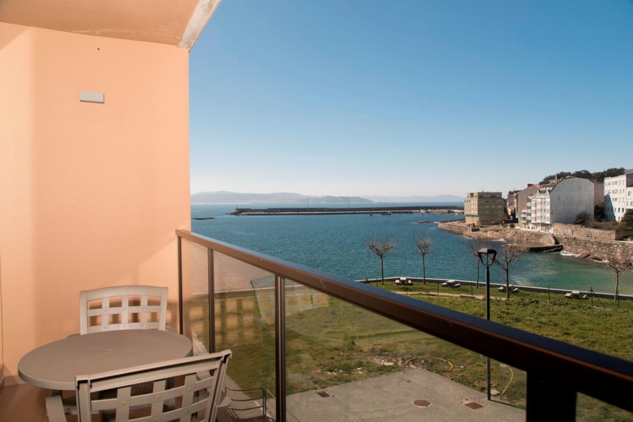 Apartamentos Turisticos Playa De Osmo Corme ภายนอก รูปภาพ